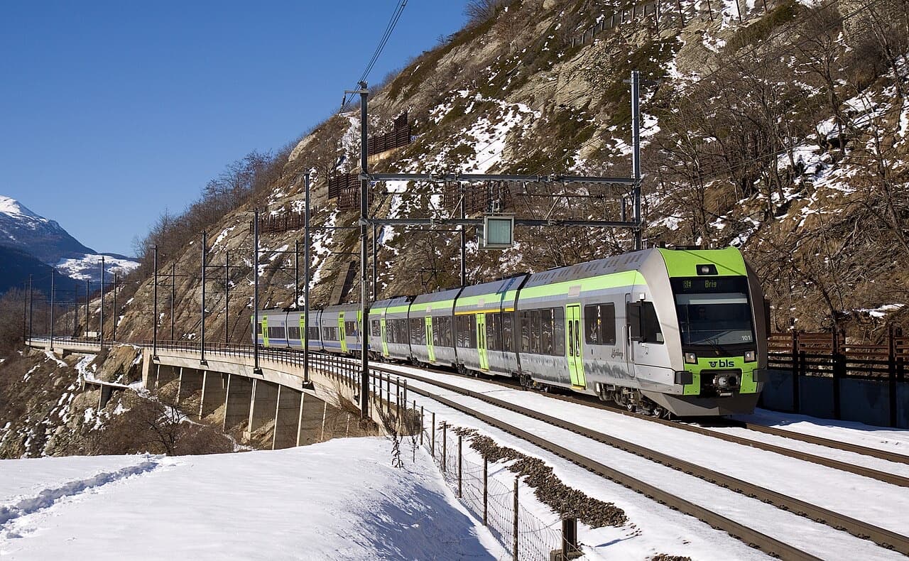 BLS RABe 535 Lötschberger on a snowy viaduct on the Lötschberg south ramp near Brig